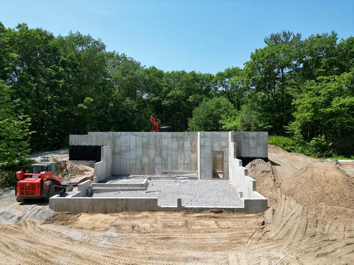 Concrete foundation walls and stepped footings