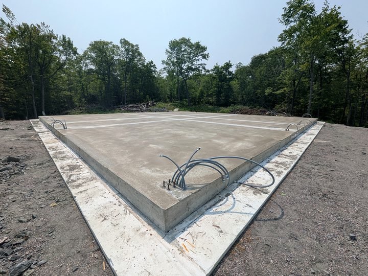 Fresh concrete slab with service penetrations