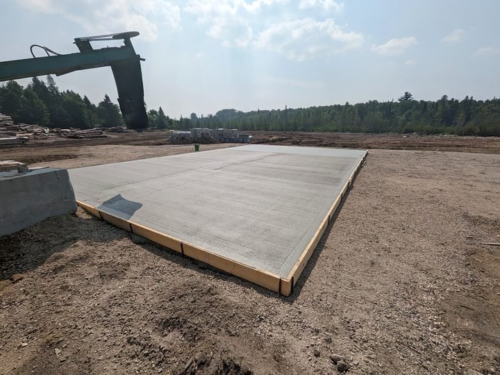 Concrete slab placement and finishing